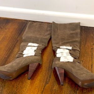 Knee high suede slouchy boot with buckles.